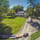 Illustration for article titled This house has a freaking train you can ride all around the property